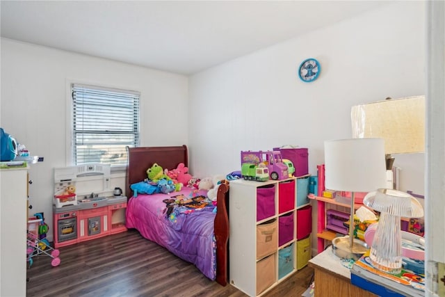 bedroom featuring dark hardwood / wood-style flooring