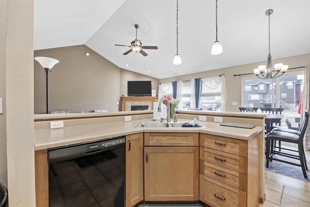 kitchen with sink, black dishwasher, vaulted ceiling, light tile patterned floors, and ceiling fan with notable chandelier