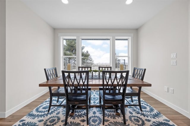 dining space featuring hardwood / wood-style flooring