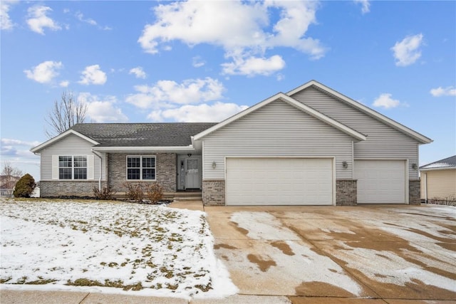 ranch-style house featuring a garage