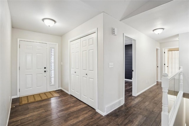 entrance foyer featuring dark hardwood / wood-style flooring