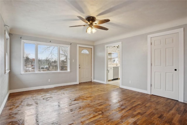 entryway with ceiling fan and light hardwood / wood-style floors