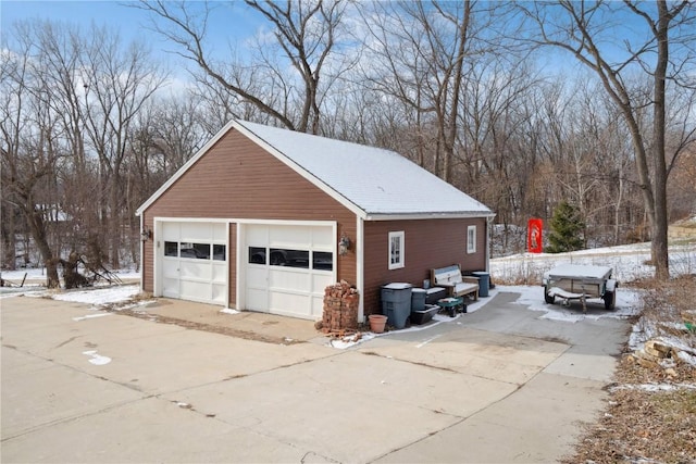 view of snow covered garage