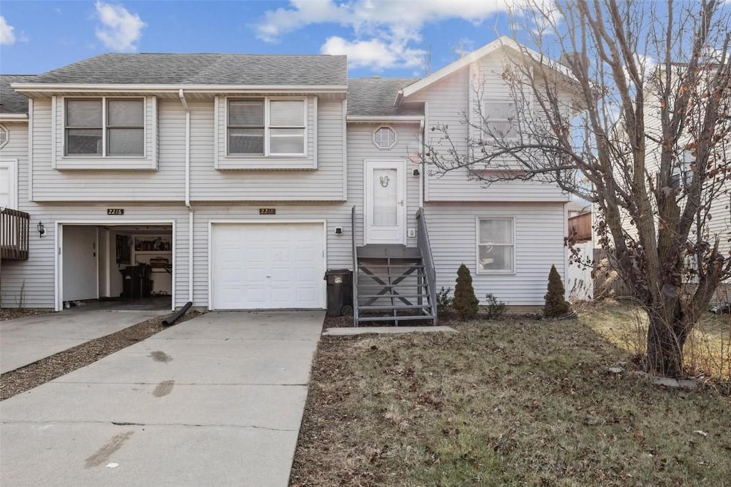 split foyer home featuring a garage