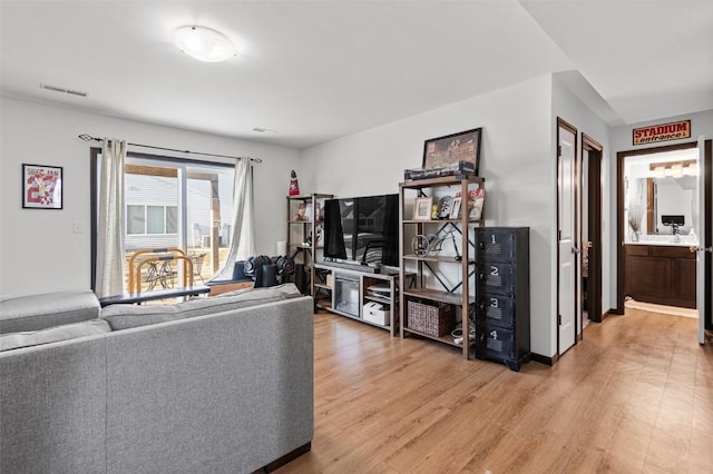 living room with hardwood / wood-style floors