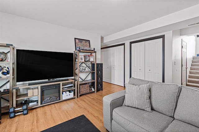 living room with wood-type flooring