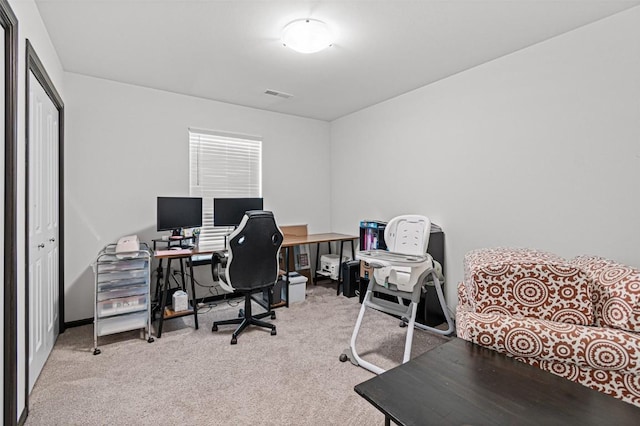 view of carpeted office space