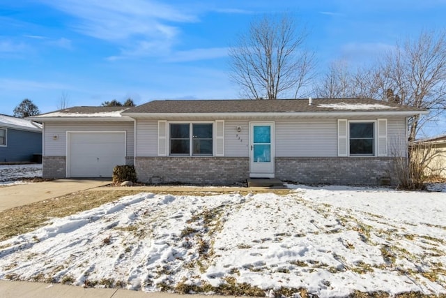 single story home featuring a garage