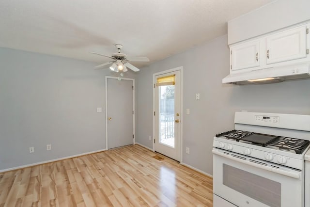 kitchen with light hardwood / wood-style floors, white cabinetry, white range with gas cooktop, and ceiling fan