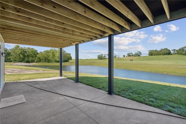 view of patio / terrace featuring a water view