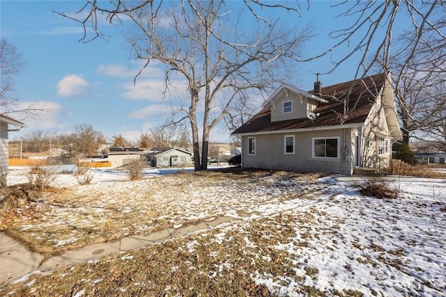 view of snow covered property