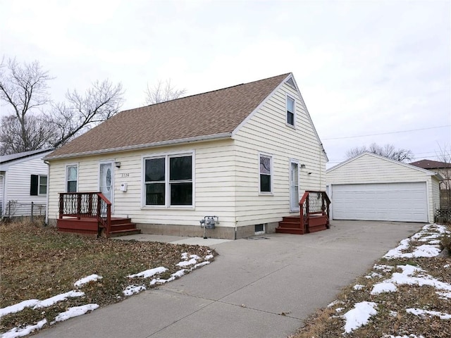 view of front of home featuring an outbuilding and a garage