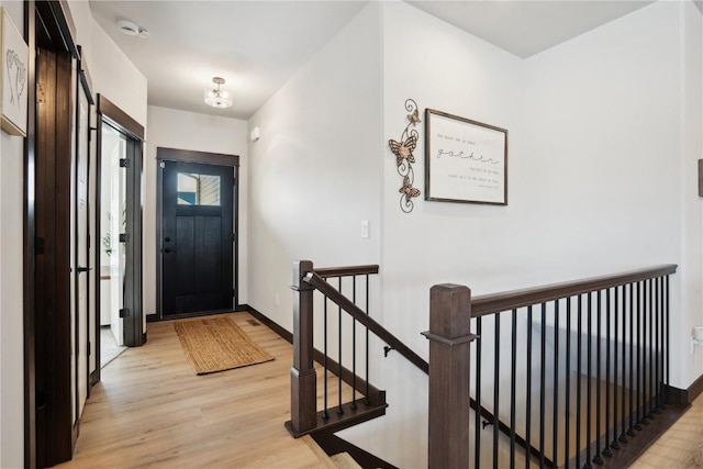 foyer with light hardwood / wood-style flooring