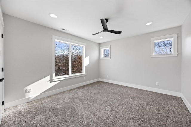 carpeted empty room with ceiling fan