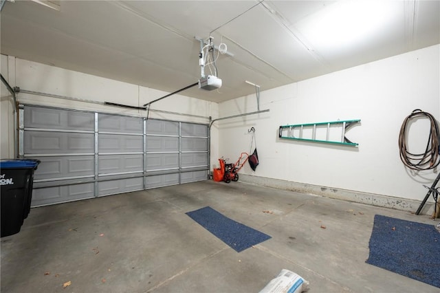 garage featuring a garage door opener