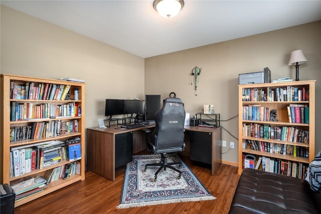 office area with hardwood / wood-style floors