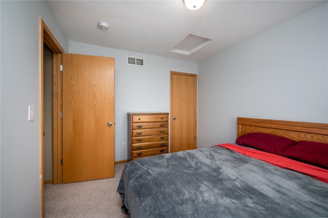 bedroom with light carpet