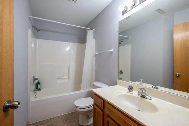 full bathroom with toilet, tile patterned flooring, shower / tub combo with curtain, and vanity