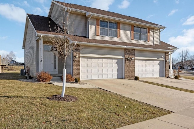 view of front of house featuring cooling unit, a front lawn, and a garage