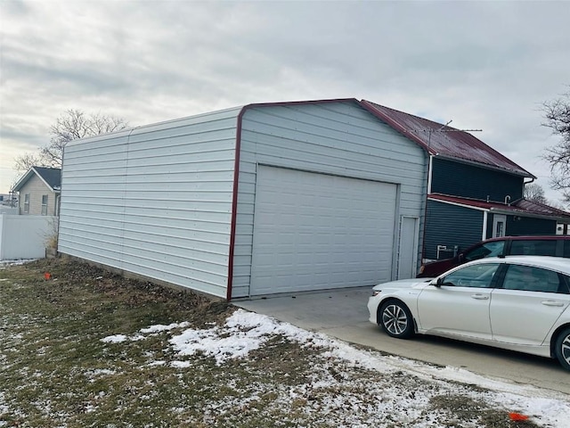 view of snow covered garage