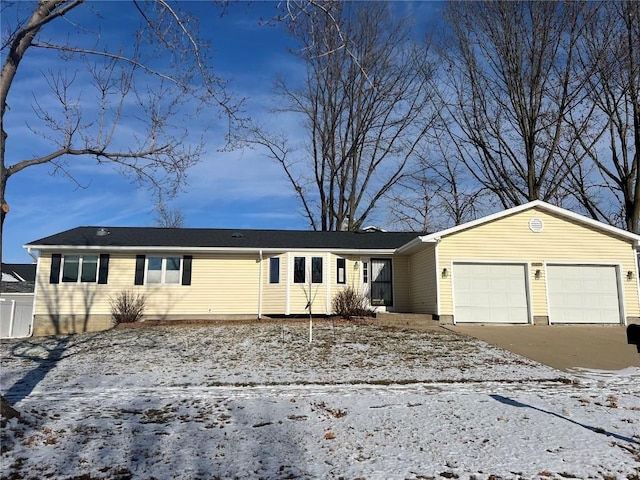 single story home with a garage