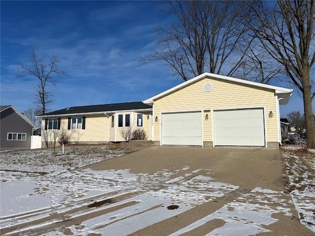 single story home with a garage