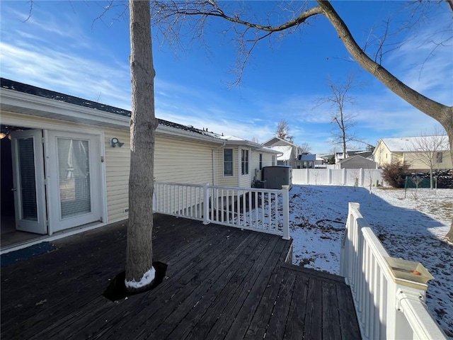 view of snow covered deck