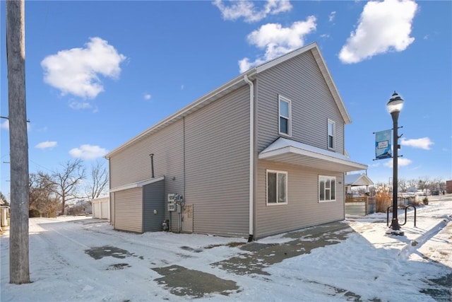 view of snow covered property