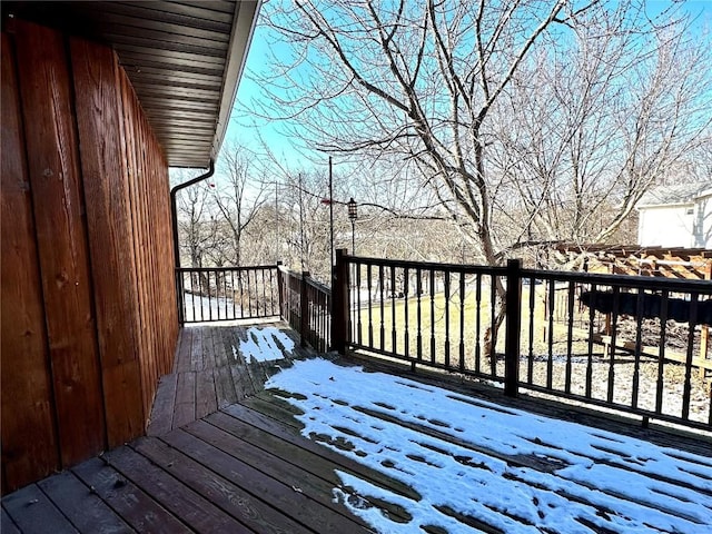 view of snow covered deck