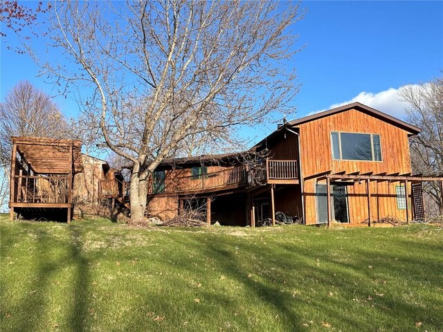 145 Fairway Dr, Lisbon, IA 52253 - rear view of property featuring a yard and a deck