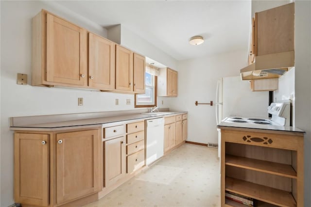 kitchen featuring sink, range with electric stovetop, dishwasher, and light brown cabinets