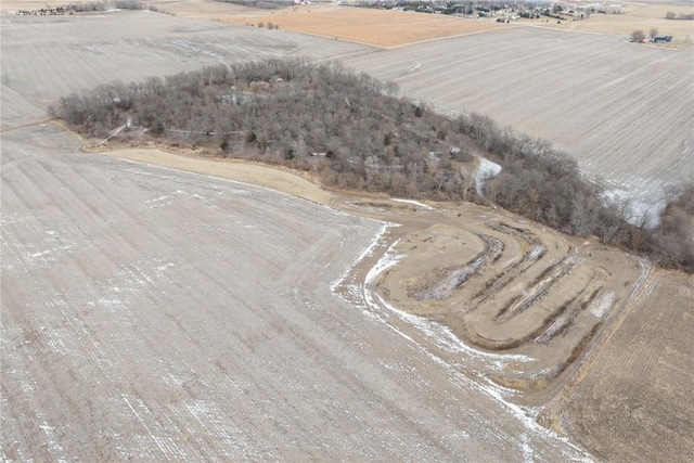 birds eye view of property with a rural view