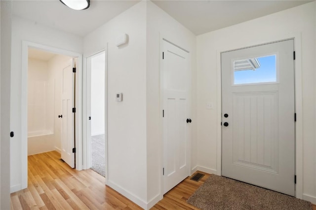 entryway featuring light hardwood / wood-style floors