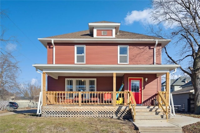 view of property featuring a porch