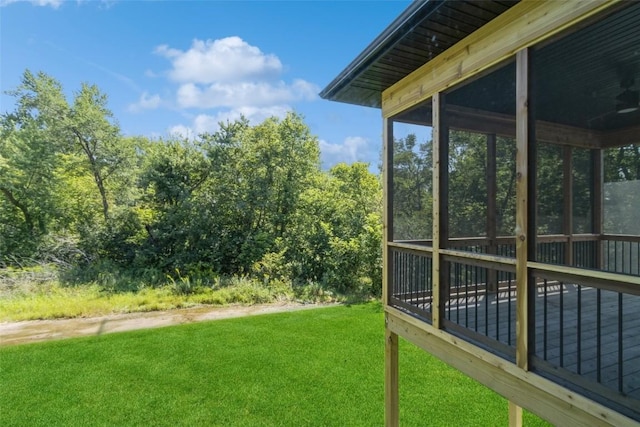 view of yard with a sunroom