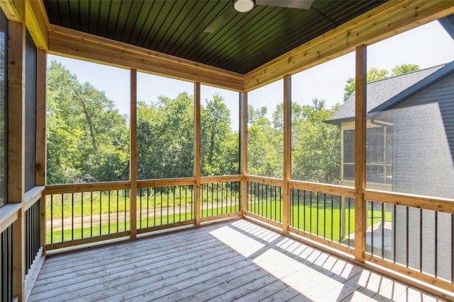 unfurnished sunroom with a wealth of natural light