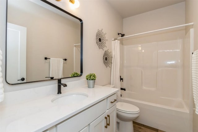 full bathroom with toilet, vanity, shower / bath combination with curtain, and hardwood / wood-style floors