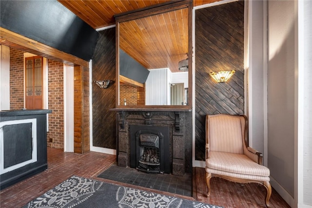 living room featuring a wood stove, wood walls, dark hardwood / wood-style floors, brick wall, and wood ceiling