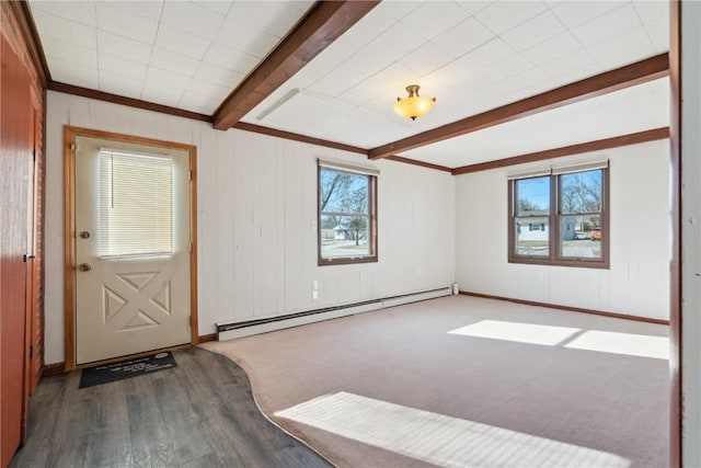 unfurnished room with baseboard heating, dark wood-type flooring, and beamed ceiling