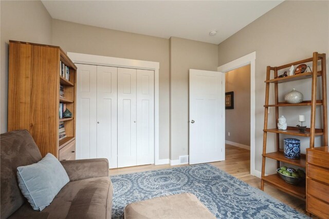 living area featuring light hardwood / wood-style floors