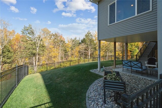 view of yard with outdoor lounge area and a patio