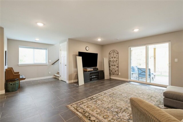 living room with plenty of natural light