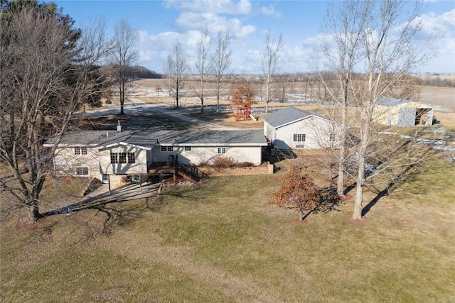 birds eye view of property with a rural view