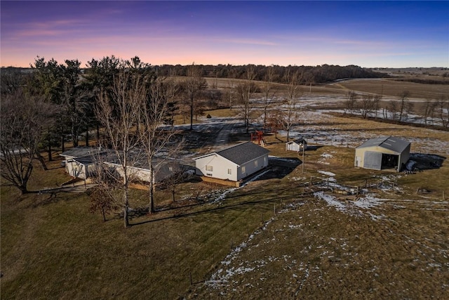 aerial view at dusk with a rural view