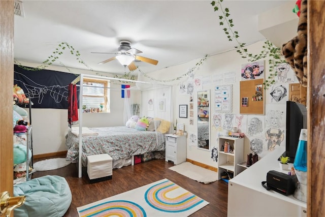 bedroom featuring ceiling fan and dark wood-type flooring