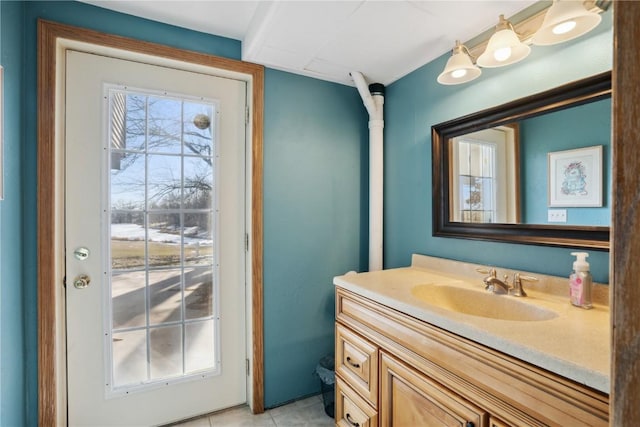 bathroom with vanity and tile patterned flooring