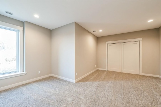 view of carpeted spare room