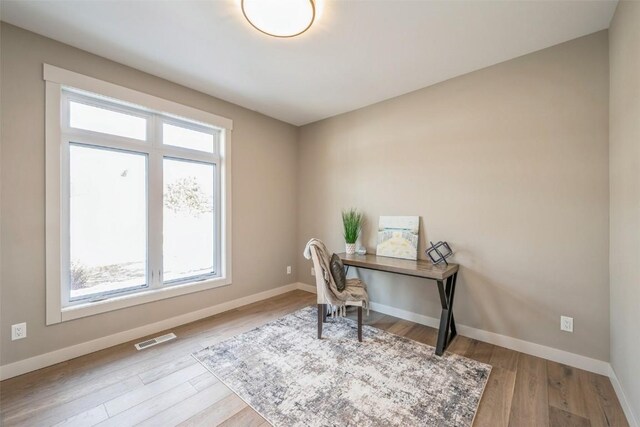 618 J Ave NE, Cedar Rapids, IA 52402 - office area with wood finished floors and baseboards
