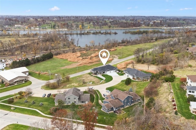 drone / aerial view featuring a water view