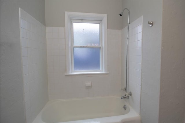 bathroom with shower / bathing tub combination